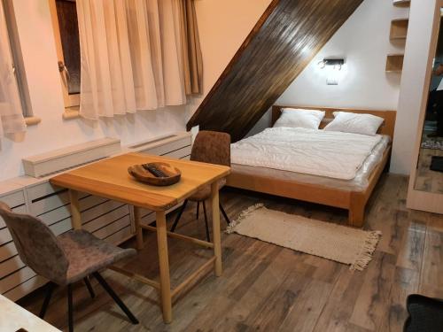 VT apartman KOZNIK Kopaonik centar stan na dan smestaj u Konacima skijasnica